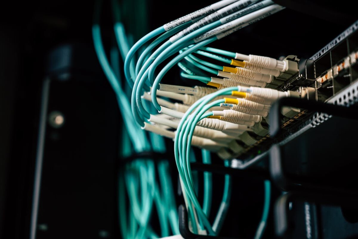 Network server cables and infrastructure in data center - Photo by Brett Sayles