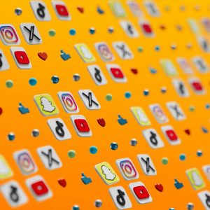 a close up of a number of stickers on a yellow background